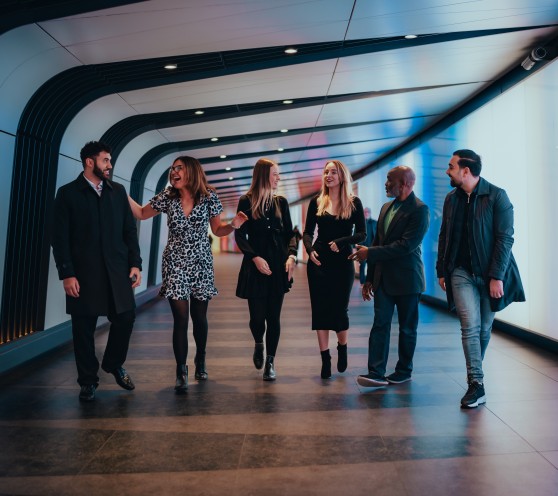 people walking and laughing