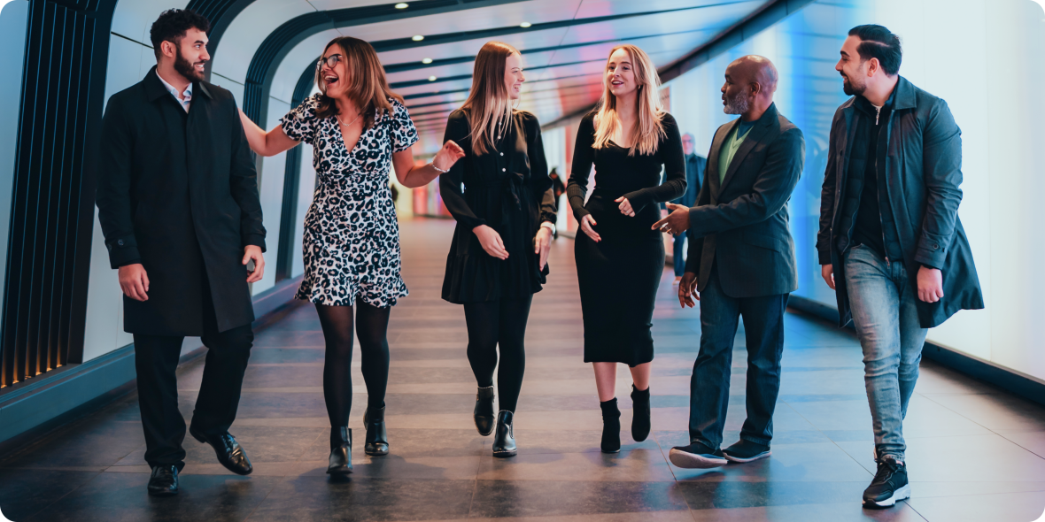 Colleagues walking & talking